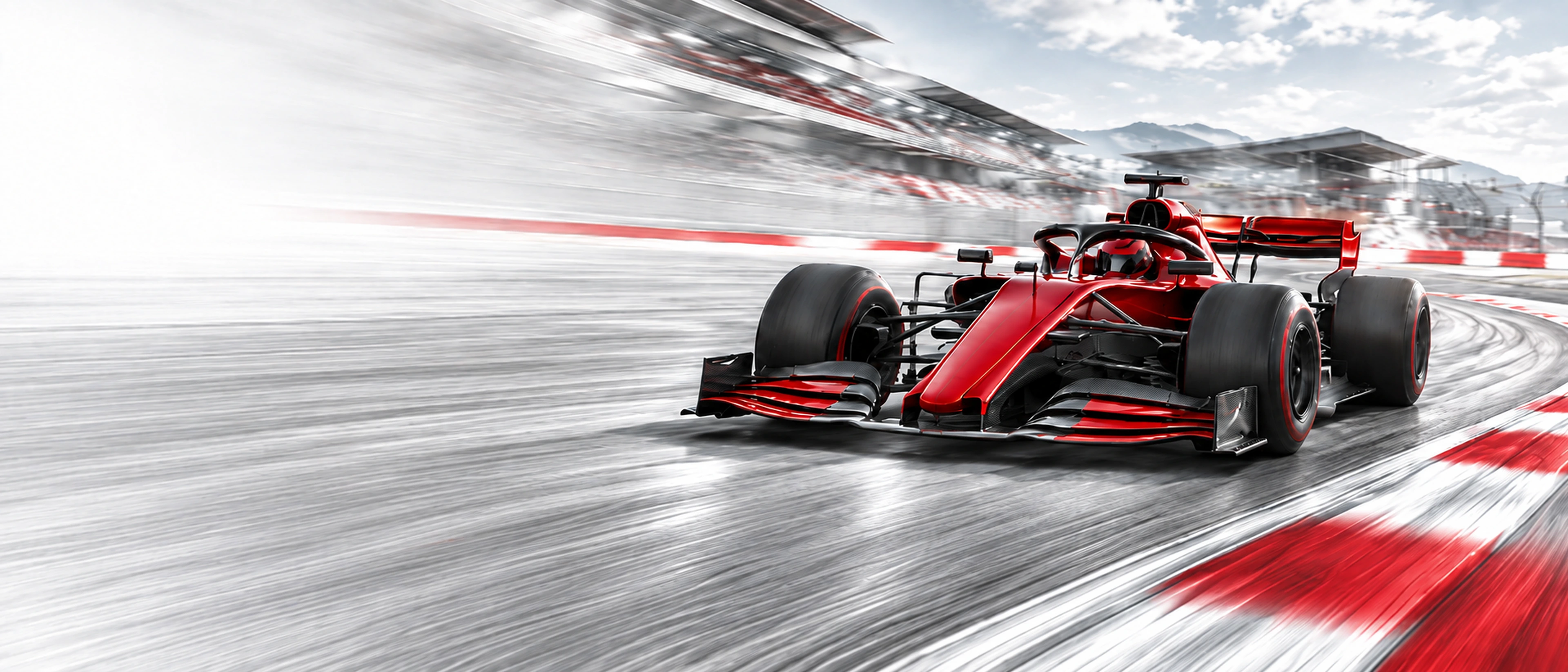 Monoplaza rojo avanzando sobre una pista